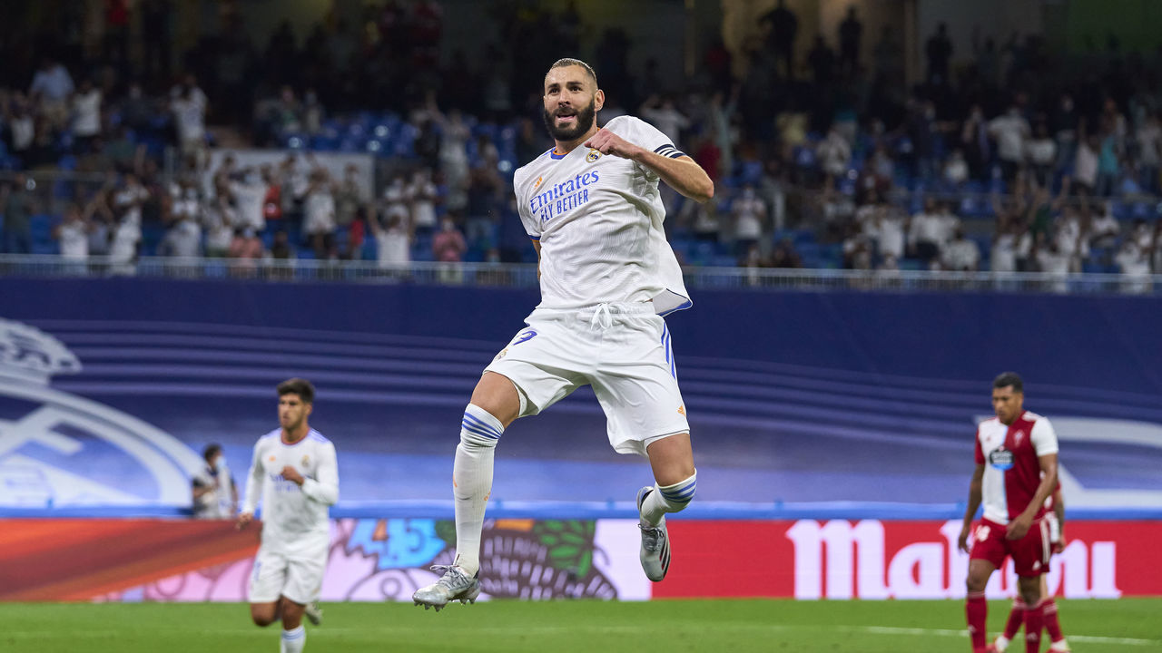 MADRID, SPAIN - SEPTEMBER 12: Karim Benzema of Real Madrid CF celebrates after scoring his team's fifth goal during the La Liga Santander match between Real Madrid CF and RC Celta de Vigo at Estadio Santiago Bernabeu on September 12, 2021 in Madrid, Spain.