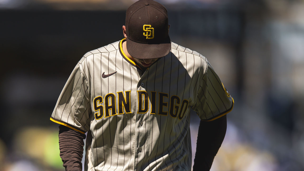 LOS ANGELES, CALIFORNIA - SEPTEMBER 12: Blake Snell #4 of the San Diego Padres walks off the mound after injuring himself against the Los Angeles Dodgers at Dodger Stadium on September 12, 2021 in Los Angeles, California.