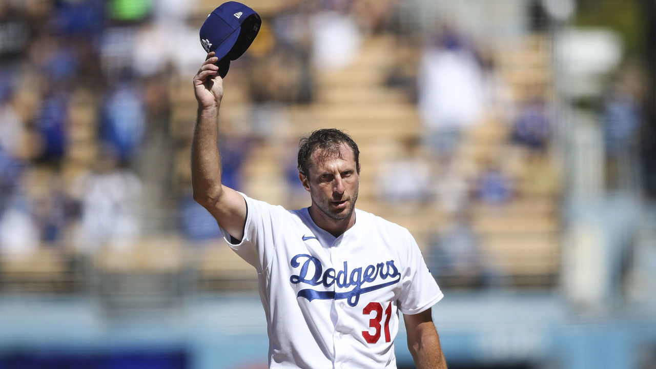 LOS ANGELES, CALIFORNIA - SEPTEMBER 12: Max Scherzer #31 of the Los Angeles Dodgers tips his hat after throwing his 3000th career strikeout in the fifth inning against the San Diego Padres at Dodger Stadium on September 12, 2021 in Los Angeles, California.
