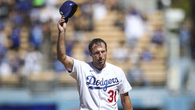 LOS ANGELES, CALIFORNIA - SEPTEMBER 12: Max Scherzer #31 of the Los Angeles Dodgers tips his hat after throwing his 3000th career strikeout in the fifth inning against the San Diego Padres at Dodger Stadium on September 12, 2021 in Los Angeles, California.