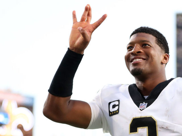 JACKSONVILLE, FLORIDA - SEPTEMBER 12: Jameis Winston #2 and P.J. Williams #26 of the New Orleans Saints celebrate after defeating the Green Bay Packers at TIAA Bank Field on September 12, 2021 in Jacksonville, Florida.