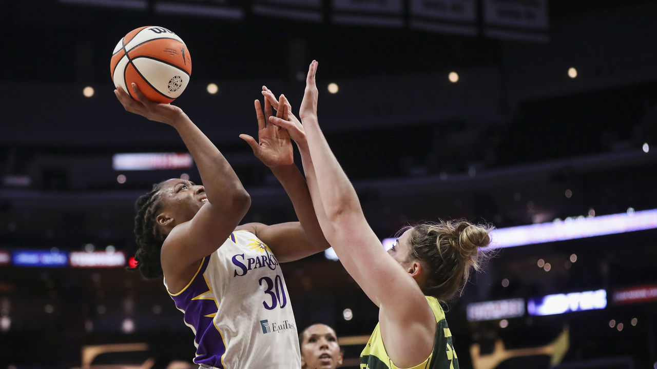 LOS ANGELES, CALIFORNIA - SEPTEMBER 12: Forward Nneka Ogwumike #30 of the Los Angeles Sparks shoots defended by forward Katie Lou Samuelson #33 of the Seattle Storm in the first half at Staples Center on September 12, 2021 in Los Angeles, California.