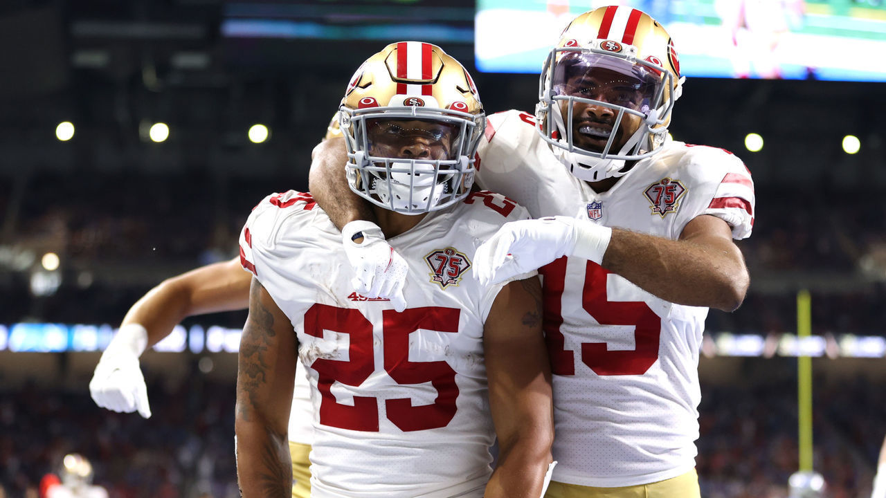 DETROIT, MICHIGAN - SEPTEMBER 12: Elijah Mitchell #25 of the San Francisco 49ers celebrates his 38-yard rushing touchdown against the Detroit Lions during the second quarter at Ford Field on September 12, 2021 in Detroit, Michigan.