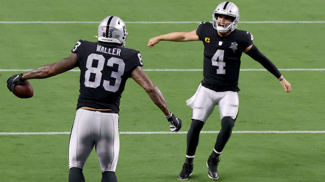 LAS VEGAS, NEVADA - SEPTEMBER 21: Darren Waller #83 of the Las Vegas Raiders celebrates a touchdown with Derek Carr #4 during the third quarter against the New Orleans Saints at Allegiant Stadium on September 21, 2020 in Las Vegas, Nevada.