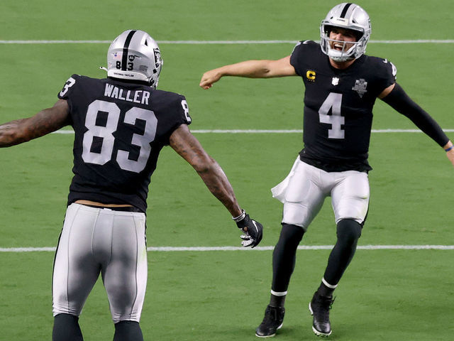 LAS VEGAS, NEVADA - SEPTEMBER 21: Darren Waller #83 of the Las Vegas Raiders celebrates a touchdown with Derek Carr #4 during the third quarter against the New Orleans Saints at Allegiant Stadium on September 21, 2020 in Las Vegas, Nevada.
