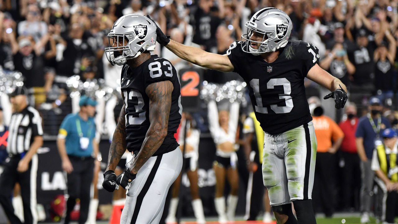 LAS VEGAS, NEVADA - SEPTEMBER 13: Darren Waller #83 of the Las Vegas Raiders celebrates with Hunter Renfrow #13 after scoring a touchdown against the Baltimore Ravens in the fourth quarter at Allegiant Stadium on September 13, 2021 in Las Vegas, Nevada.