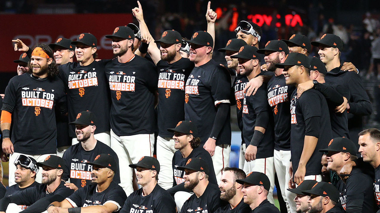 SAN FRANCISCO, CALIFORNIA - SEPTEMBER 13: The San Francisco Giants pose for a team photo on the field after they clinched a playoff birth by beating the San Diego Padres at Oracle Park on September 13, 2021 in San Francisco, California.