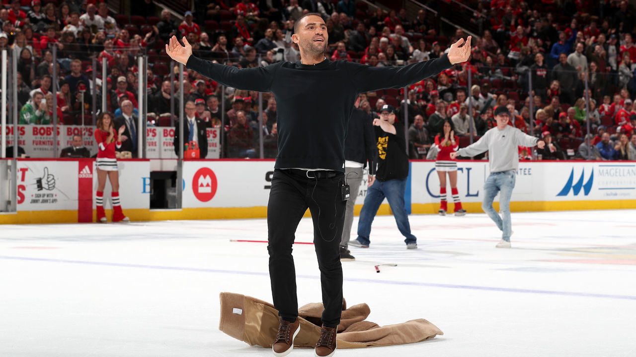 CHICAGO, IL - OCTOBER 24: Former NHL player Paul Bissonnette reacts after making his shot on the ice in between periods of the game between the Chicago Blackhawks and the Philadelphia Flyers at the United Center on October 24, 2019 in Chicago, Illinois.