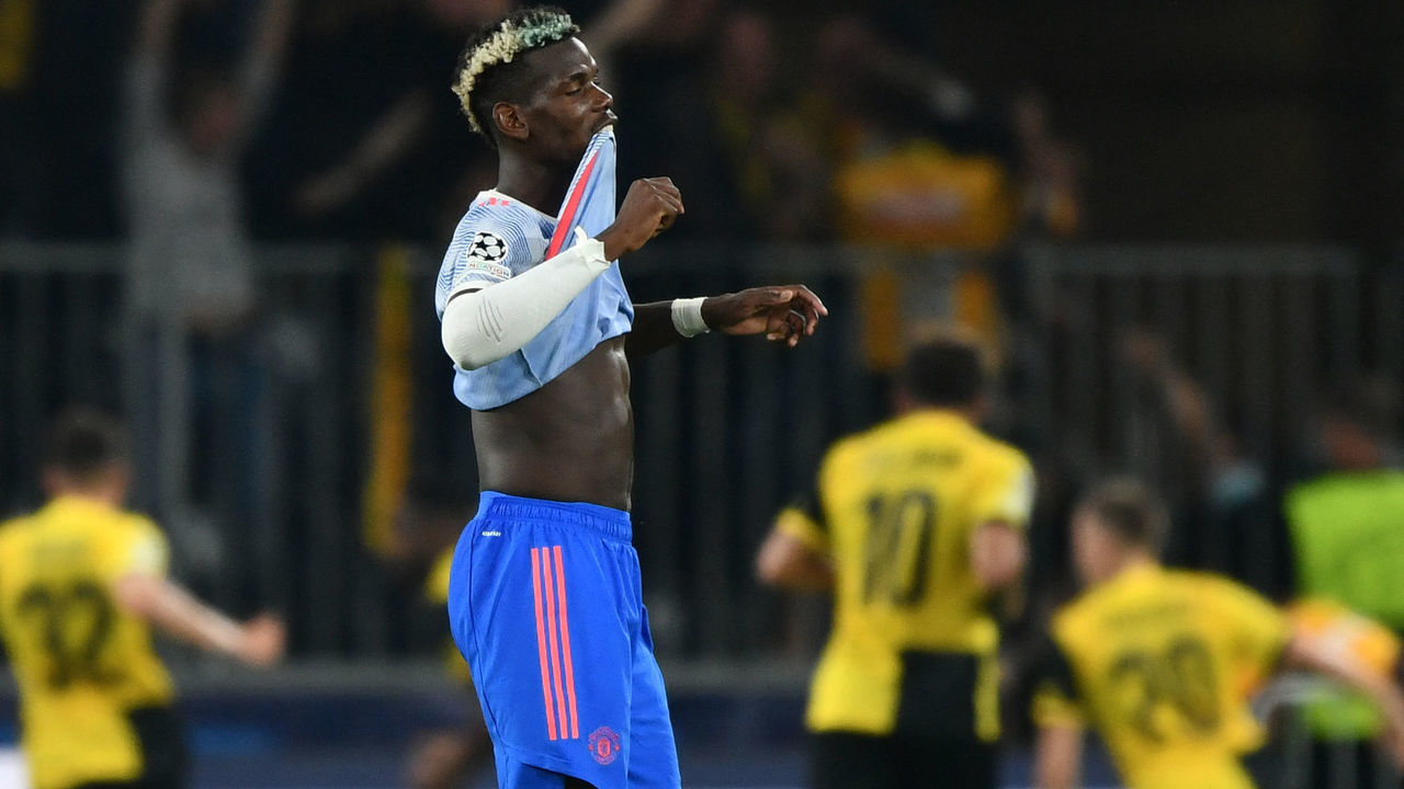 Manchester United's French midfielder Paul Pogba reacts after Young Boys' US forward Jordy Siebatcheu Pefok (unseen) scored a goal during the UEFA Champions League Group F football match between Young Boys and Manchester United at Wankdorf stadium in Bern, on September 14, 2021.