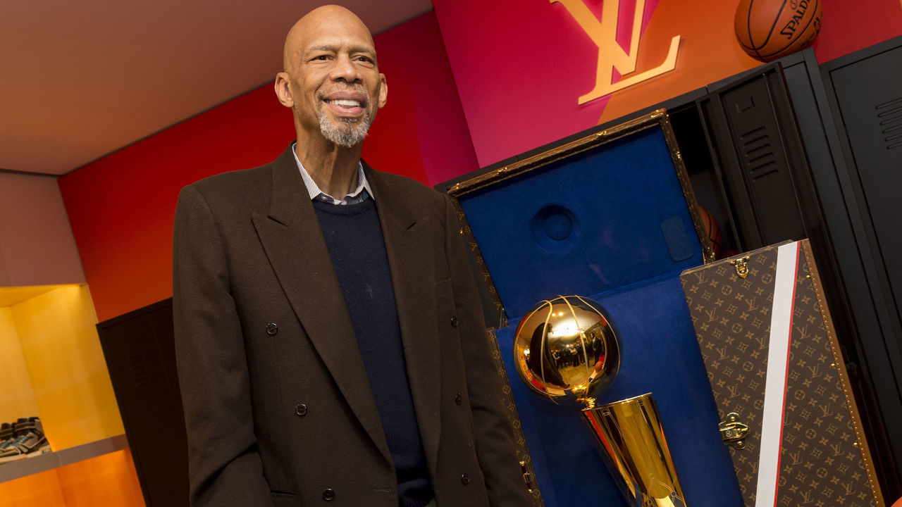 PARIS, FRANCE - JANUARY 22: NBA Legend, Kareem Abdul-Jabbar poses for a photo next to the Louis Vuitton trunk for the Larry O'Brien Trophy during the Louis Vuitton Announcement Party as part of NBA Paris Games 2020 on January 22, 2020 in Paris, France at LVMH Headquarters. NOTE TO USER: User expressly acknowledges and agrees that, by downloading and/or using this Photograph, user is consenting to the terms and conditions of the Getty Images License Agreement. Mandatory Copyright Notice: Copyright 2020 NBAE