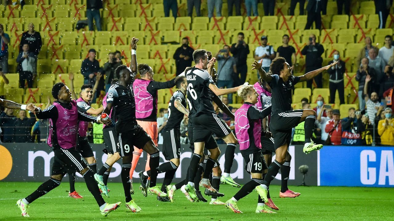 Sheriff's players celebrate after the UEFA Champions League football match between FC Sheriff and FC Shakhtar Donetsk at Sheriff Stadium in Tiraspol on September 15, 2021.
