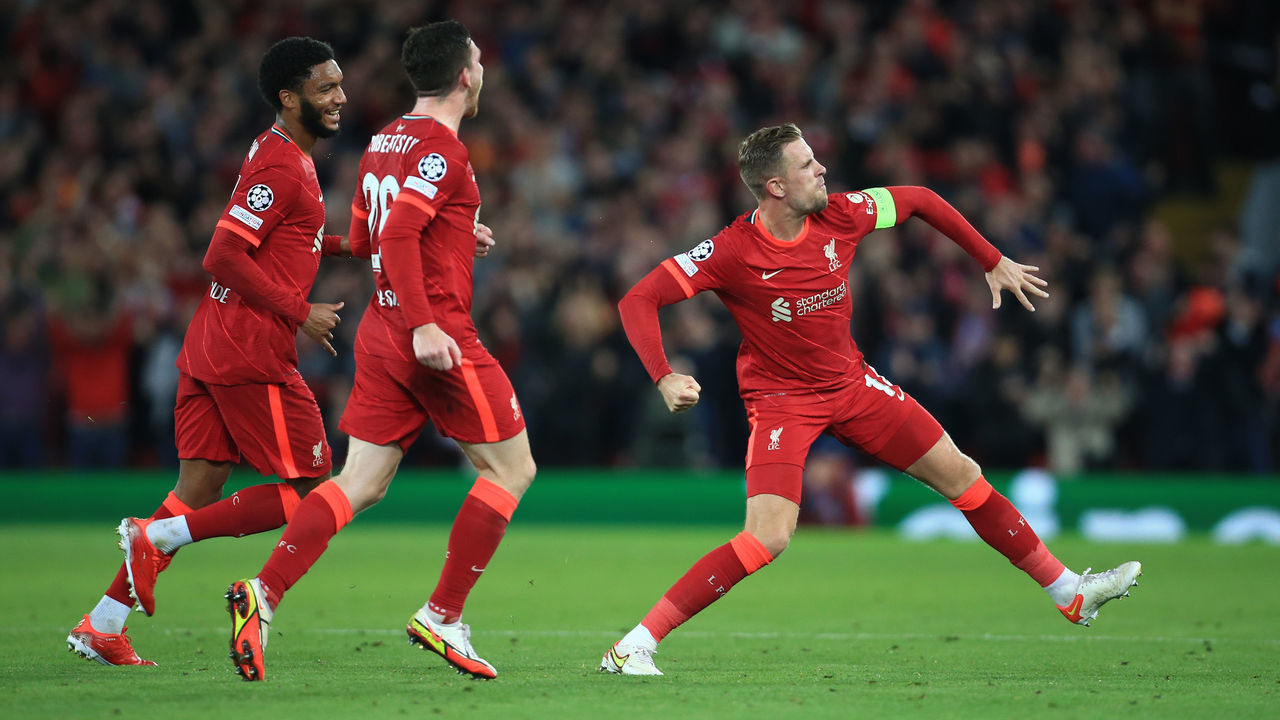 LIVERPOOL, ENGLAND - SEPTEMBER 15: Jordan Henderson of Liverpool celebrates after scoring the third goal for his team during the UEFA Champions League group B match between Liverpool FC and AC Milan at Anfield on September 15, 2021 in Liverpool, United Kingdom.