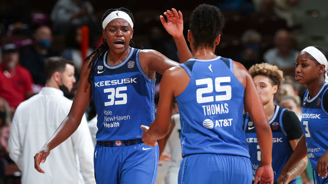 UNCASVILLE, CT - SEPTEMBER 15: Jonquel Jones #35 of the Connecticut Sun high fives Alyssa Thomas #25 of the Connecticut Sun during the game against the New York Liberty on September 15, 2021 at Mohegan Sun Arena in Uncasville, Connecticut. Mandatory Copyright Notice: Copyright 2021 NBAE