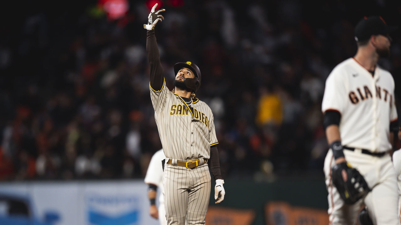 SAN FRANCISCO, CALIFORNIA - SEPTEMBER 15: Fernando Tatis Jr. #21 of the San Diego Padres celebrates after hitting a double in the second inning against the San Francisco Giants at Oracle Park on September 15, 2021 in San Francisco, California. Puerto Rican MLB players and staff are being given the option of wearing #21 in honor of Roberto Clemente Day.