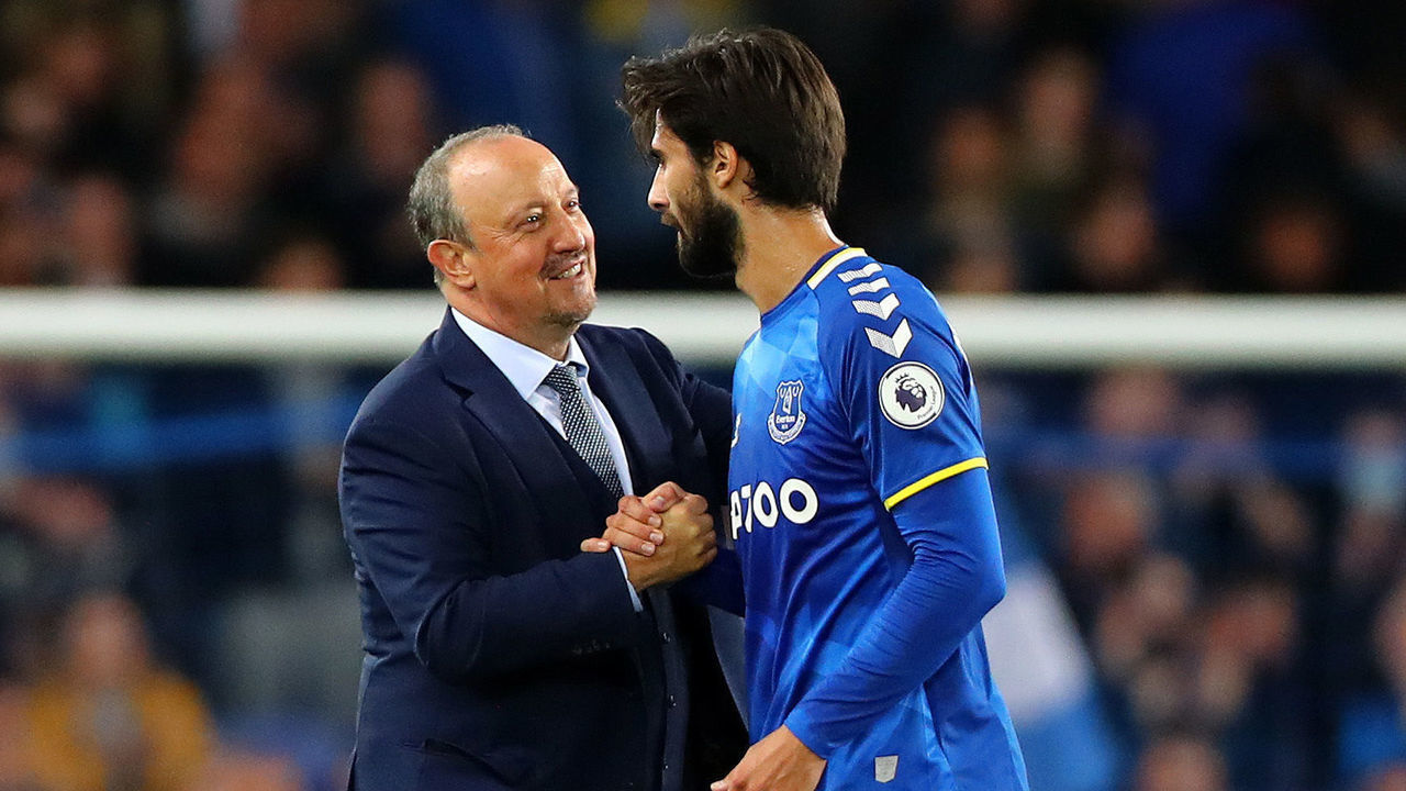 LIVERPOOL, ENGLAND - SEPTEMBER 13: Manager of Everton Rafael Benitez and Andre Gomez of Everton shake hands after the Premier League match between Everton and Burnley at Goodison Park on September 13, 2021 in Liverpool, England.