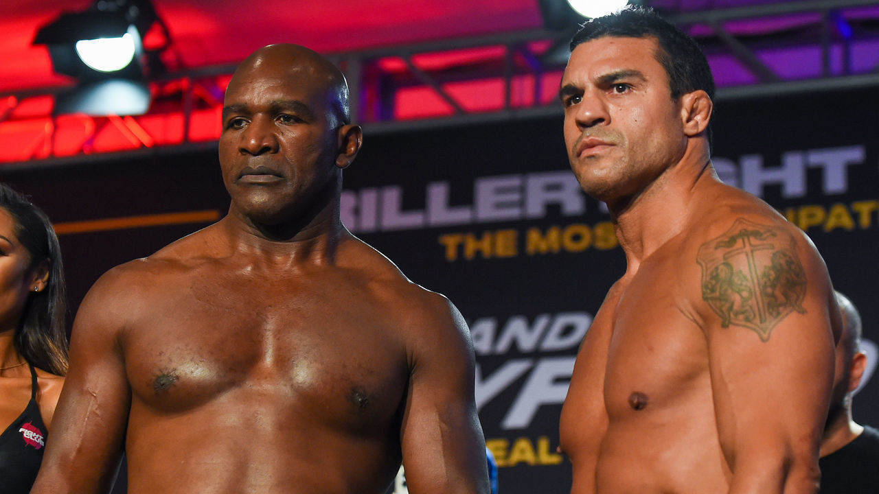 FORT LAUDERDALE, FL - SEPTEMBER 10: Evander Holyfield (L) and Vitor Belfort (R) pose during the weigh-in ahead of their fight on September 11 at The Harbor Beach Marriott on September 10, 2021 in Fort Lauderdale, Florida.