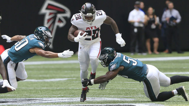 ATLANTA, GA - SEPTEMBER 12: Mike Davis #28 of the Atlanta Falcons rushes during the 2021 Week 1 NFL game between the Atlanta Falcons and the Philadelphia Eagles on September 12, 2021 at Mercedes-Benz Stadium in Atlanta, Georgia.
