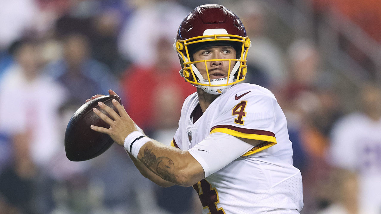 LANDOVER, MARYLAND - SEPTEMBER 16: Taylor Heinicke #4 of the Washington Football Team looks to pass during the first half against the New York Giants at FedExField on September 16, 2021 in Landover, Maryland.