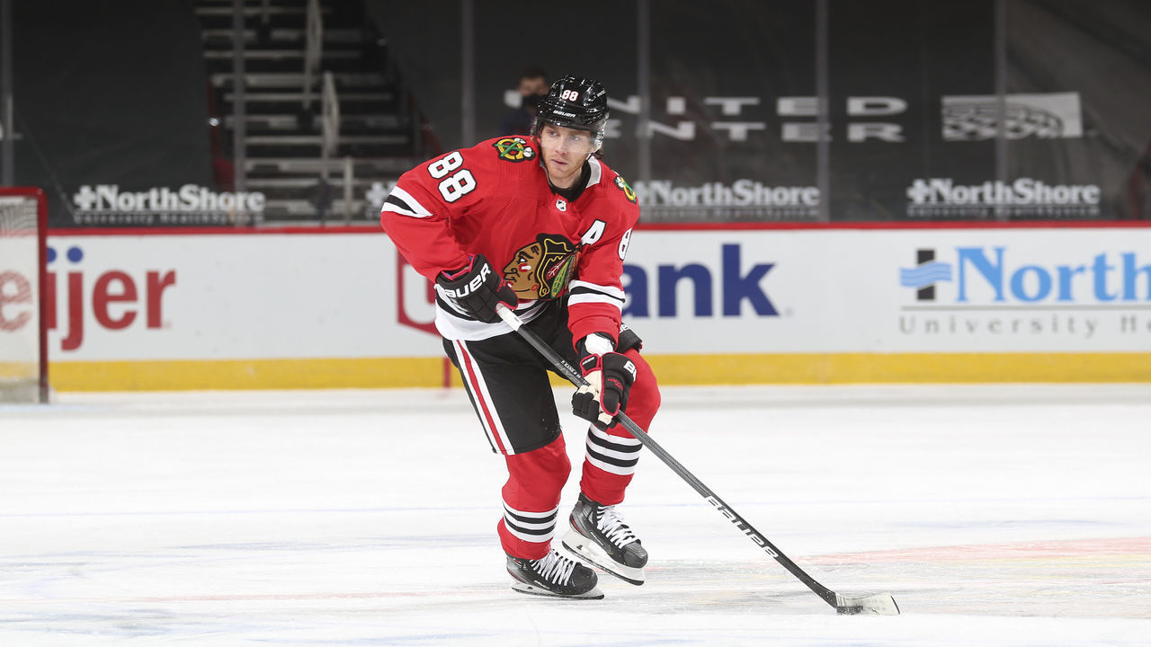 CHICAGO, ILLINOIS - JANUARY 29: Patrick Kane #88 of the Chicago Blackhawks skates with the puck against the Columbus Blue Jackets in the first period at the United Center on January 29, 2021 in Chicago, Illinois.