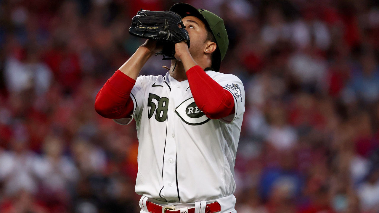 CINCINNATI, OHIO - SEPTEMBER 17: Luis Castillo #58 of the Cincinnati Reds reacts after recording a strikeout in the third inning against the Los Angeles Dodgers at Great American Ball Park on September 17, 2021 in Cincinnati, Ohio.