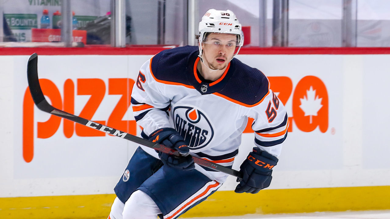 WINNIPEG, MB - MAY 24: Kailer Yamamoto #56 of the Edmonton Oilers keeps an eye on the play during second period action against the Winnipeg Jets in Game Four of the First Round of the 2021 Stanley Cup Playoffs at Bell MTS Place on May 24, 2021 in Winnipeg, Manitoba.