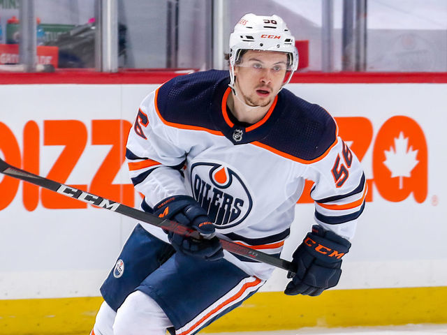 WINNIPEG, MB - MAY 24: Kailer Yamamoto #56 of the Edmonton Oilers keeps an eye on the play during second period action against the Winnipeg Jets in Game Four of the First Round of the 2021 Stanley Cup Playoffs at Bell MTS Place on May 24, 2021 in Winnipeg, Manitoba.