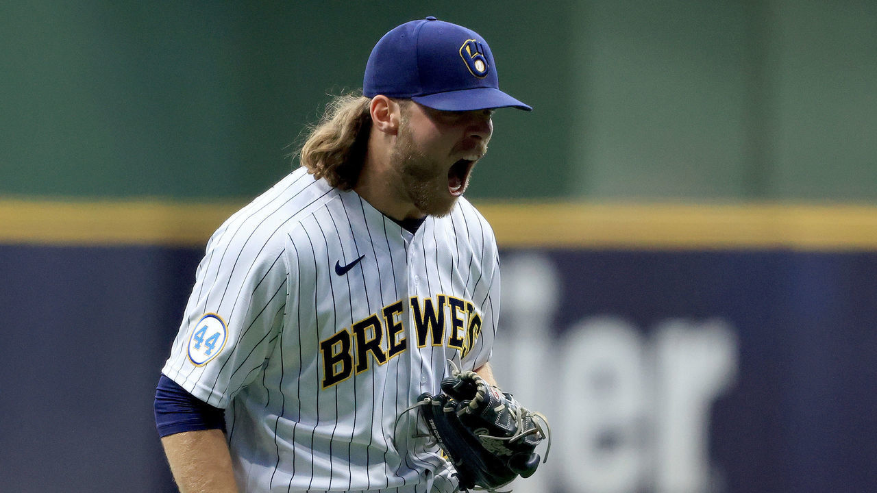 MILWAUKEE, WISCONSIN - SEPTEMBER 18: Corbin Burnes #39 of the Milwaukee Brewers reacts after striking out a batter during the second inning in the game against the Chicago Cubs at American Family Field on September 18, 2021 in Milwaukee, Wisconsin.