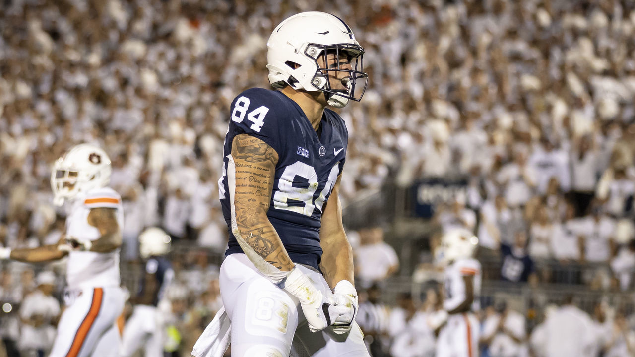 STATE COLLEGE, PA - SEPTEMBER 18: Theo Johnson #84 of the Penn State Nittany Lions celebrates after a play against the Auburn Tigers during the first half at Beaver Stadium on September 18, 2021 in State College, Pennsylvania.