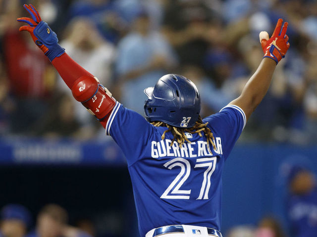 TORONTO, ON - SEPTEMBER 17: Vladimir Guerrero Jr. #27 of the Toronto Blue Jays celebrates a solo home run in the third inning of their MLB game against the Minnesota Twins at Rogers Centre on September 17, 2021 in Toronto, Ontario.