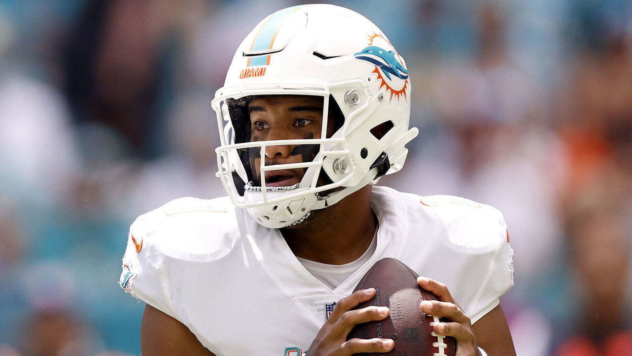 MIAMI GARDENS, FLORIDA - SEPTEMBER 19: Quarterback Tua Tagovailoa #1 of the Miami Dolphins looks to make a pass play against the Buffalo Bills in the first half of the game at Hard Rock Stadium on September 19, 2021 in Miami Gardens, Florida.