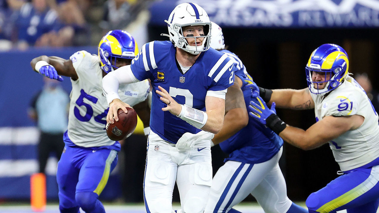 INDIANAPOLIS, INDIANA - SEPTEMBER 19: Quarterback Carson Wentz #2 of the Indianapolis Colts looks to make a pass play against the Los Angeles Rams in the first half of the game at Lucas Oil Stadium on September 19, 2021 in Indianapolis, Indiana.