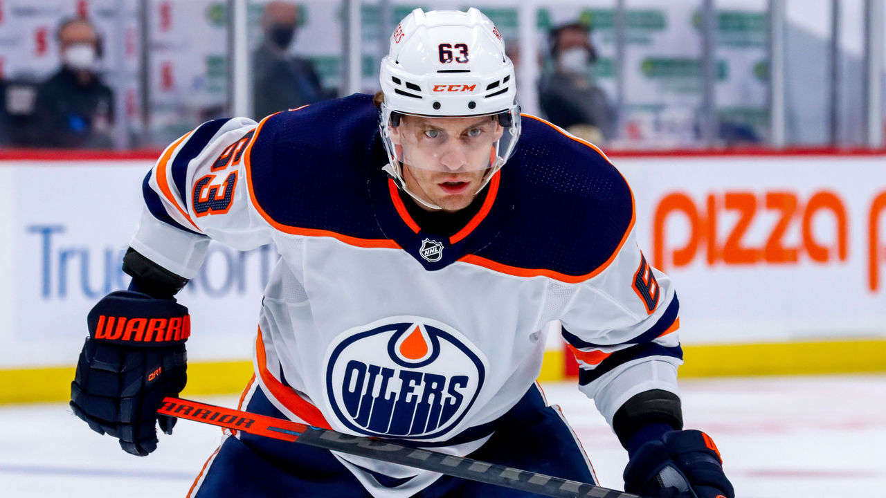 WINNIPEG, MB - MAY 23: Tyler Ennis #63 of the Edmonton Oilers prepares for a third period face-off against the Winnipeg Jets in Game Three of the First Round of the 2021 Stanley Cup Playoffs at Bell MTS Place on May 23, 2021 in Winnipeg, Manitoba.