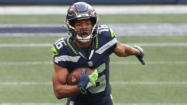 SEATTLE, WASHINGTON - DECEMBER 06: Tyler Lockett #16 of the Seattle Seahawks runs with the ball in the third quarter against the New York Giants at Lumen Field on December 06, 2020 in Seattle, Washington.