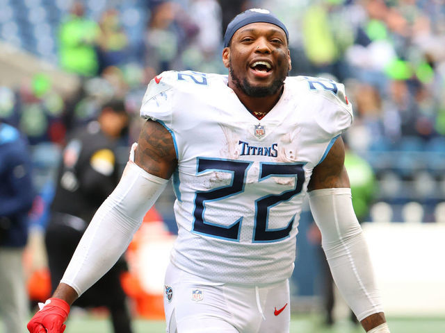 SEATTLE, WASHINGTON - SEPTEMBER 19: Derrick Henry #22 of the Tennessee Titans celebrates after the 33-30 overtime win against the Seattle Seahawks at Lumen Field on September 19, 2021 in Seattle, Washington.
