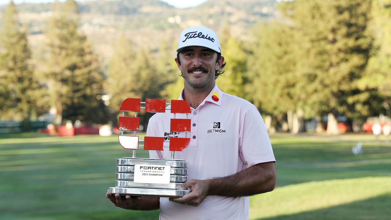 NAPA, CALIFORNIA - SEPTEMBER 19: Max Homa celebrates with the champion's trophy after winning the Fortinet Championship at Silverado Resort and Spa on September 19, 2021 in Napa, California.