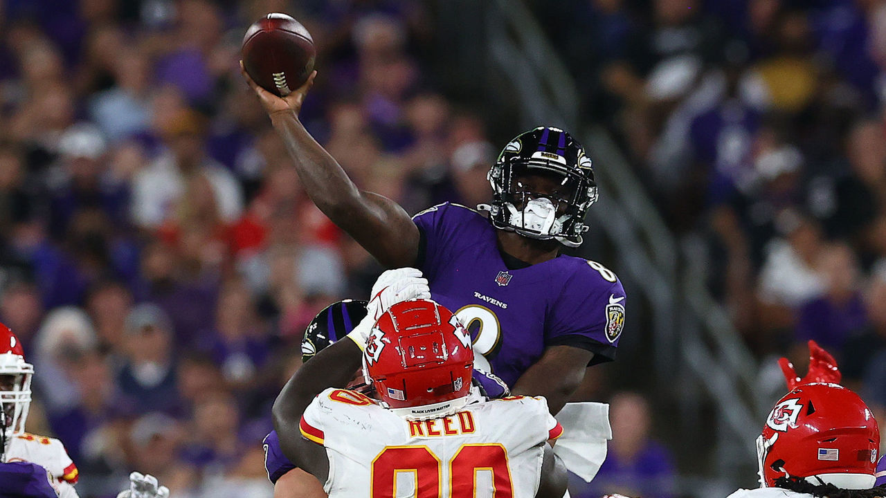 BALTIMORE, MARYLAND - SEPTEMBER 19: Lamar Jackson #8 of the Baltimore Ravens throws a touchdown pass to Marquise Brown #5 (not pictured) during the third quarter against the Kansas City Chiefs at M&T Bank Stadium on September 19, 2021 in Baltimore, Maryland.