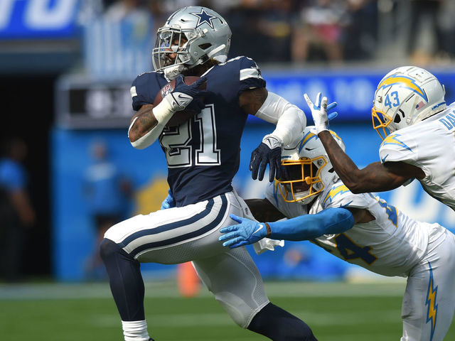 INGLEWOOD, CA - SEPTEMBER 19: Dallas Cowboys Running Back Ezekiel Elliott (21) runs the ball during an NFL game between the Dallas Cowboys and the Los Angeles Chargers on September 19, 2021, at SoFi Stadium in Inglewood, CA.