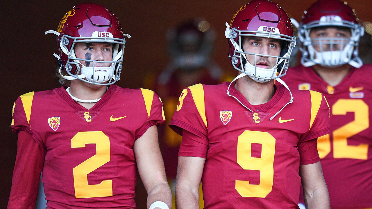 LOS ANGELES, CA - SEPTEMBER 11: USC Trojans quarterback Jaxson Dart (2) and USC Trojans quarterback Kedon Slovis (9) walk to the field before a college football game between the Stanford Cardinal and the USC Trojans on September 11, 2021, at Los Angeles Memorial Coliseum in Los Angeles, CA.