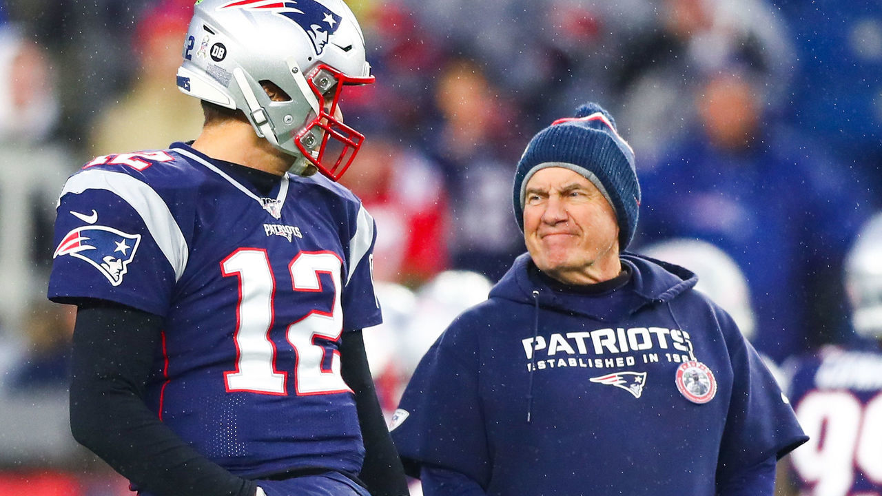 FOXBOROUGH, MA - NOVEMBER 24: Tom Brady #12 talks to head coach Bill Belichick of the New England Patriots before a game against the Dallas Cowboys at Gillette Stadium on November 24, 2019 in Foxborough, Massachusetts.