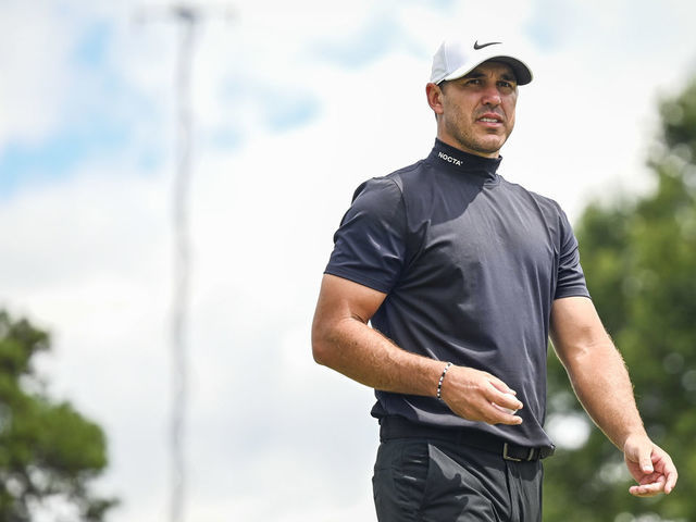 ATLANTA, GA - SEPTEMBER 02: Brooks Koepka, wearing a Nike NOCTA turtleneck, walks off the third hole green during the first round of the TOUR Championship, the final event of the FedExCup Playoffs, at East Lake Golf Club on September 2, 2021 in Atlanta, Georgia.