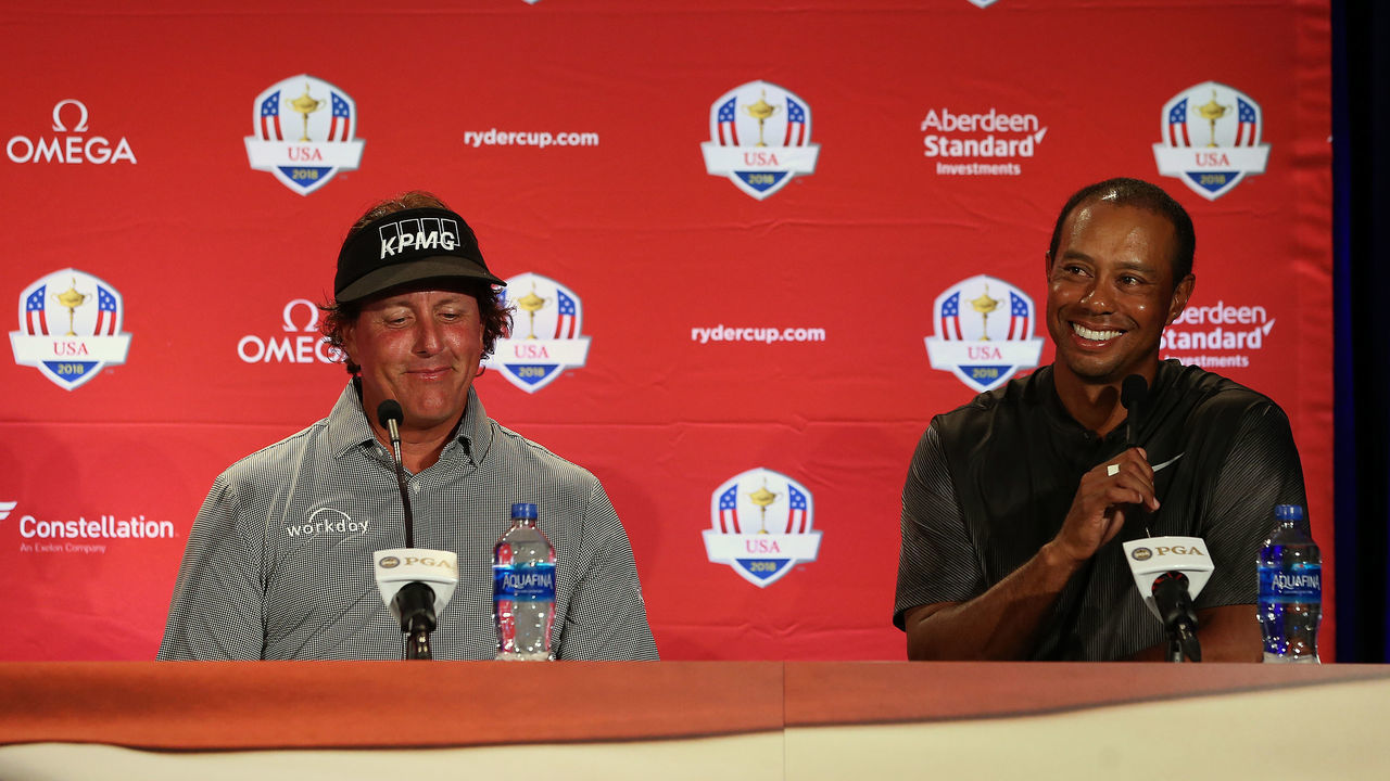 WEST CONSHOHOCKEN, PA - SEPTEMBER 04: Phil Mickelson and Tiger Woods along with Bryson DeChambeau after being chosen by U.S. Ryder Cup Team Captain Jim Furyk, as his Captains Picks for the 2018 team during a press conference at the Philadelphia Marriott West on September 4, 2018 in West Conshohocken, Pennsylvania.