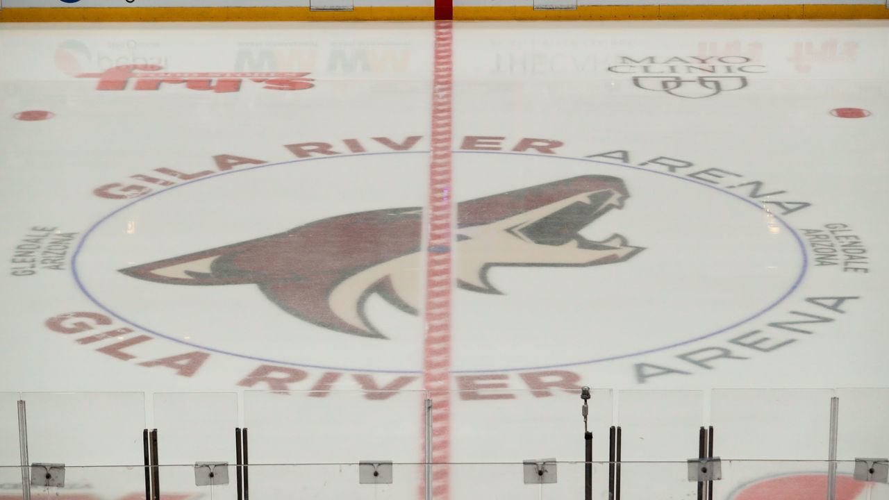 GLENDALE, AZ - MARCH 26: The Coyotes logo on the ice during the NHL hockey game between the Chicago Blackhawks and the Arizona Coyotes on March 26, 2019 at Gila River Arena in Glendale, Arizona.