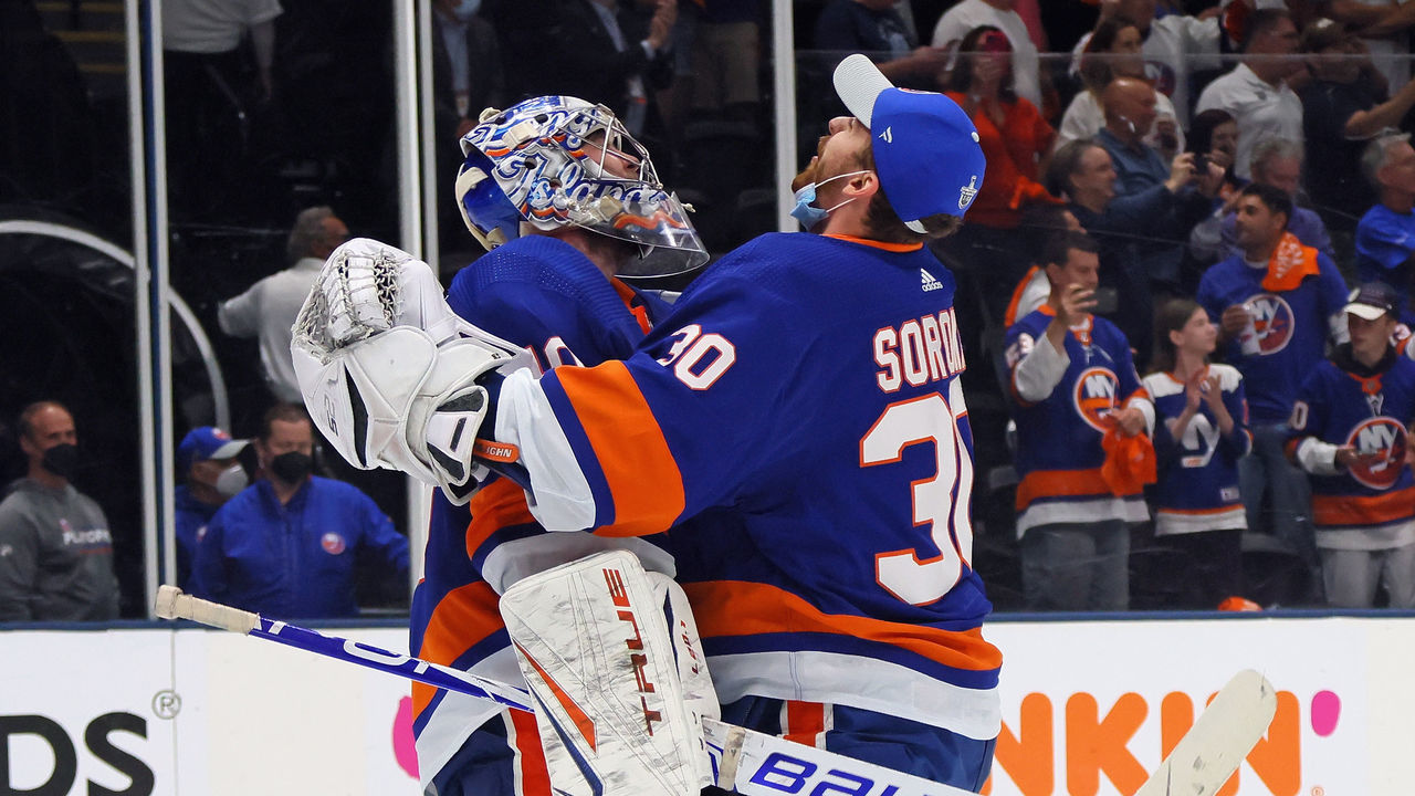 UNIONDALE, NEW YORK - JUNE 09: Semyon Varlamov #40 and Ilya Sorokin #30 of the New York Islanders celebrate a 6-2 victory over the Boston Bruins in Game Six of the Second Round of the 2021 NHL Stanley Cup Playoffs at the Nassau Coliseum on June 09, 2021 in Uniondale, New York.
