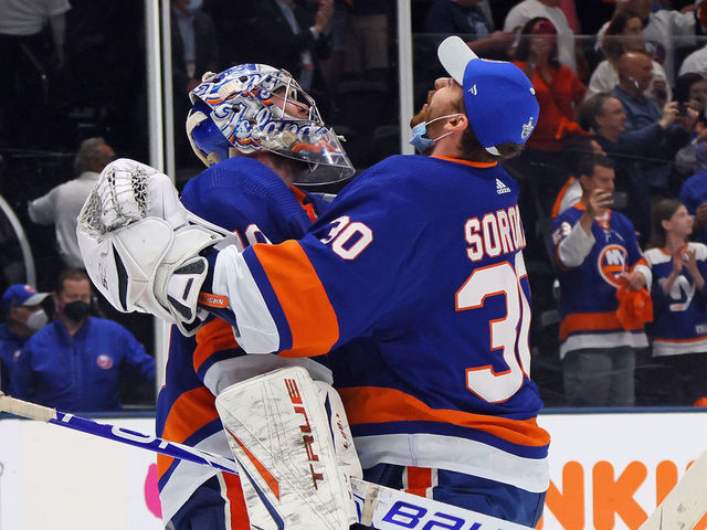 UNIONDALE, NEW YORK - JUNE 09: Semyon Varlamov #40 and Ilya Sorokin #30 of the New York Islanders celebrate a 6-2 victory over the Boston Bruins in Game Six of the Second Round of the 2021 NHL Stanley Cup Playoffs at the Nassau Coliseum on June 09, 2021 in Uniondale, New York.