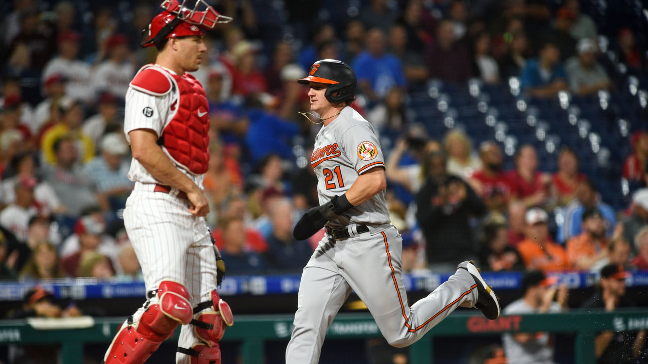 PHILADELPHIA, PA - SEPTEMBER 20: Baltimore Orioles left fielder Austin Hays (21) scores a run past Philadelphia Phillies catcher J.T. Realmuto (10) in the first inning of the Major League Baseball game between the Baltimore Orioles and Philadelphia Phillies on September 20, 2021 at Citizens Bank Park in Philadelphia, PA.