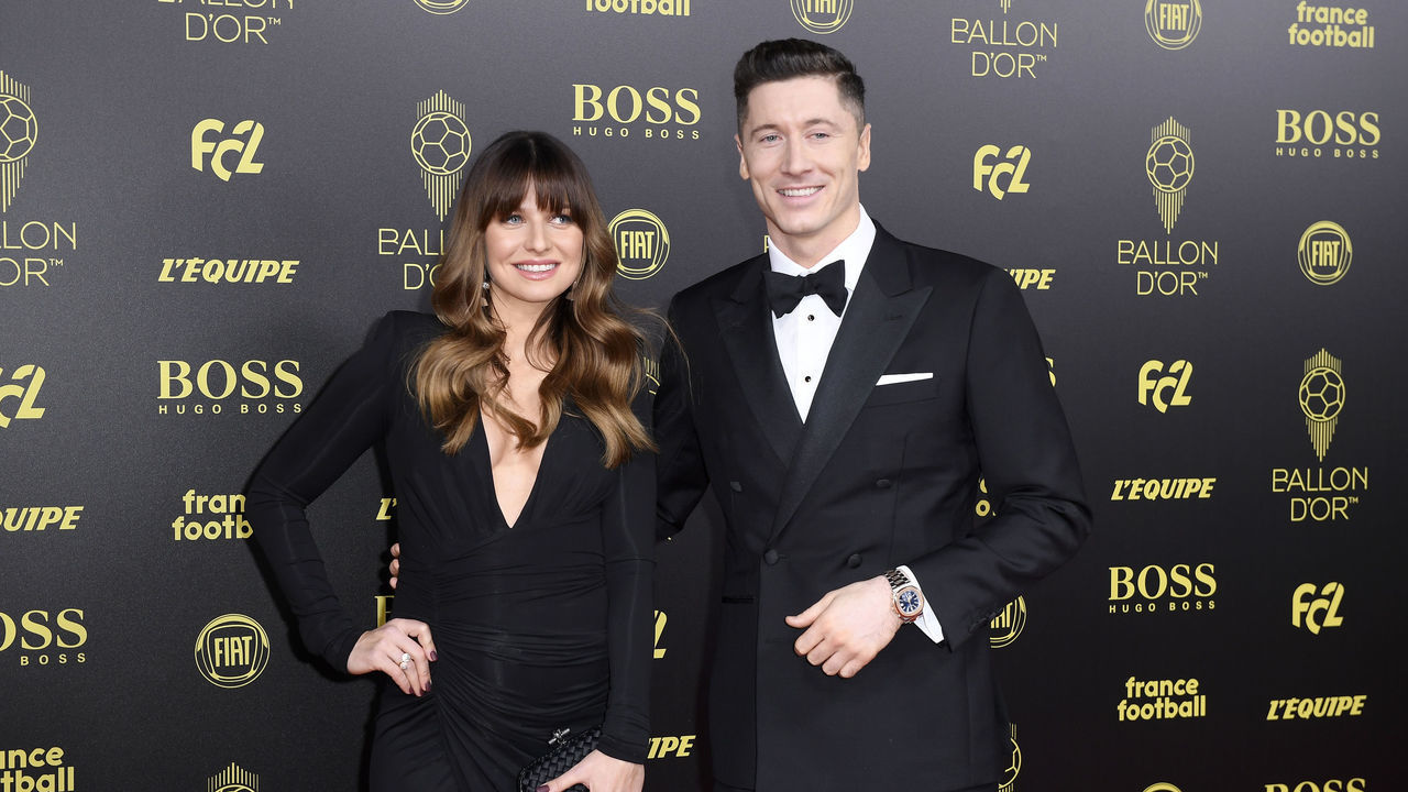 PARIS, FRANCE - DECEMBER 02: Robert Lewandowski (Poland / Bayern Munich) poses on the red carpet with his wife Anna Lewandowska during the Ballon D'Or Ceremony at Theatre Du Chatelet on December 02, 2019 in Paris, France.