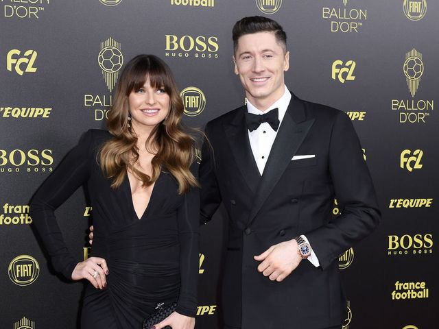 PARIS, FRANCE - DECEMBER 02: Robert Lewandowski (Poland / Bayern Munich) poses on the red carpet with his wife Anna Lewandowska during the Ballon D'Or Ceremony at Theatre Du Chatelet on December 02, 2019 in Paris, France.