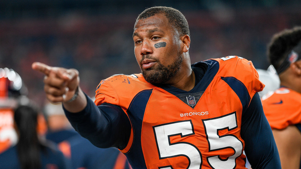 DENVER, COLORADO - AUGUST 28: Bradley Chubb #55 of the Denver Broncos stands in the bench area during an NFL preseason game against the Los Angeles Rams at Empower Field at Mile High on August 28, 2021 in Denver, Colorado.