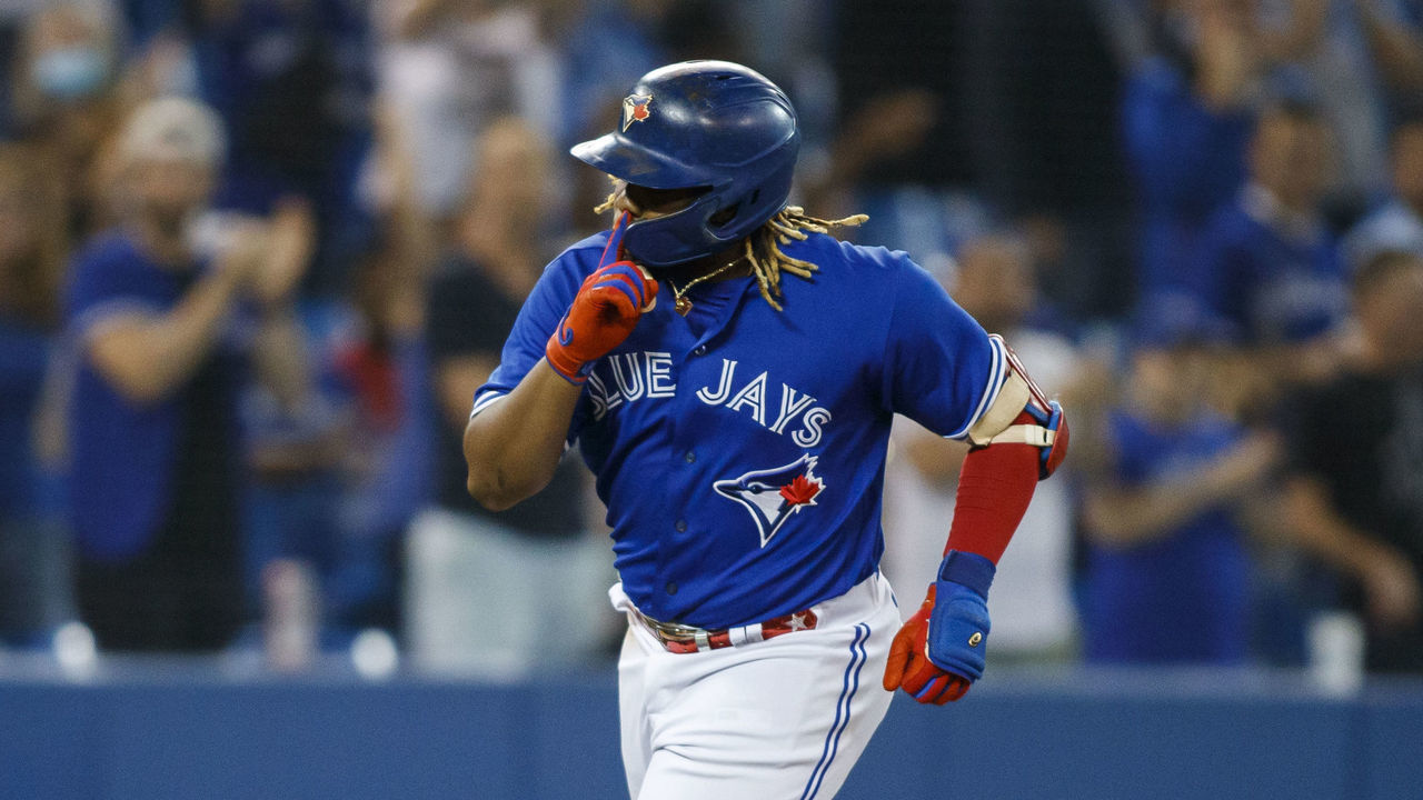 TORONTO, ON - SEPTEMBER 17: Vladimir Guerrero Jr. #27 of the Toronto Blue Jays runs out a solo home run in the third inning of their MLB game against the Minnesota Twins at Rogers Centre on September 17, 2021 in Toronto, Ontario.