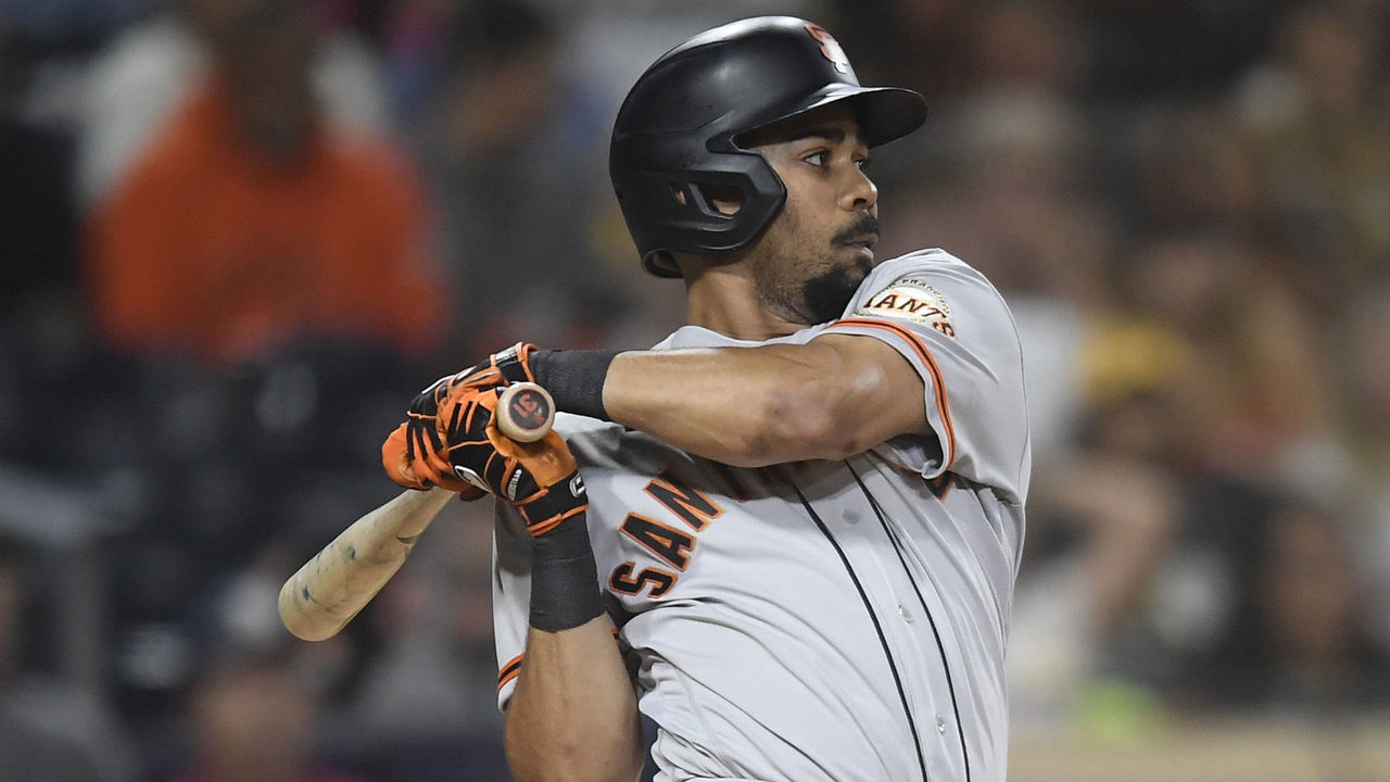 SAN DIEGO, CA - SEPTEMBER 21: LaMonte Wade Jr. #31 of the San Francisco Giants hits an RBI single during the ninth inning of a baseball game against the San Diego Padres at Petco Park on September 21, 2021 in San Diego, California.